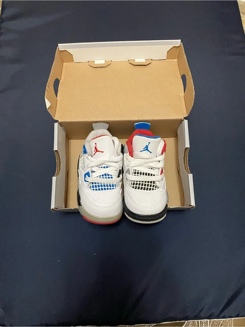 Nike Kids' White Sneakers with Red & Blue Accents